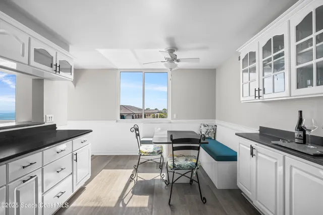 a view of a dining room with furniture