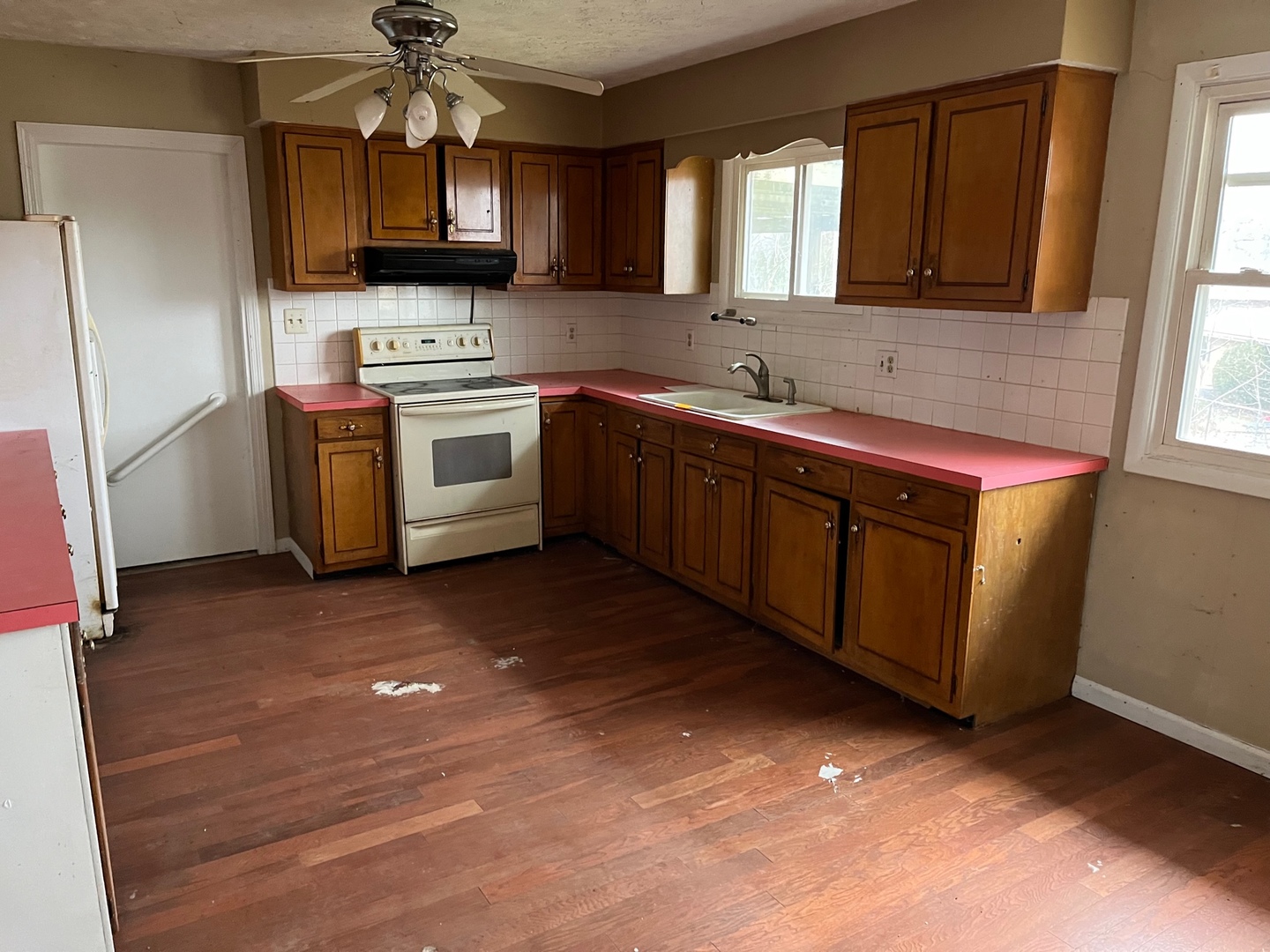 709 Kathleen Drive Normal, IL 61761 - Photo 14 of 32 a kitchen with stainless steel appliances granite countertop a sink a stove and a refrigerator