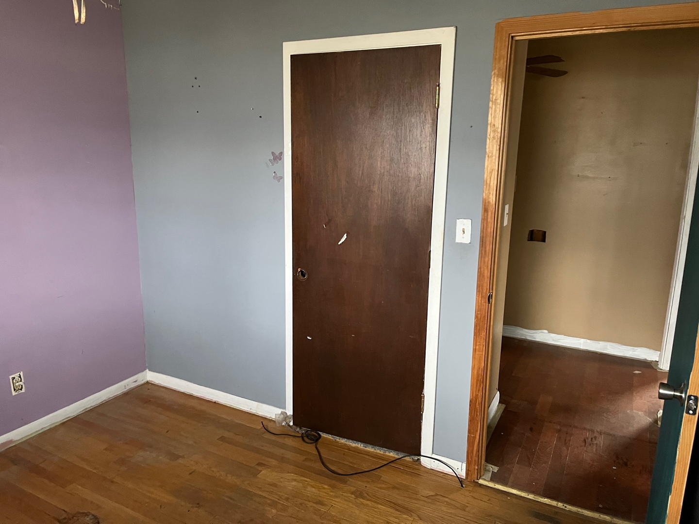 709 Kathleen Drive Normal, IL 61761 - Photo 23 of 32 an empty room with wooden floor and entrance