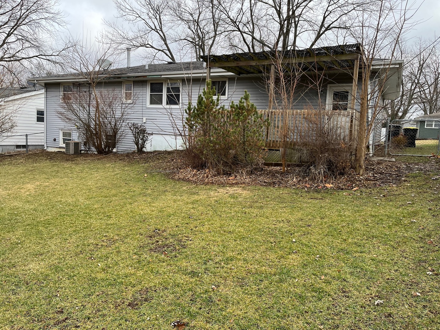 709 Kathleen Drive Normal, IL 61761 - Photo 7 of 32 a front view of a house with garden