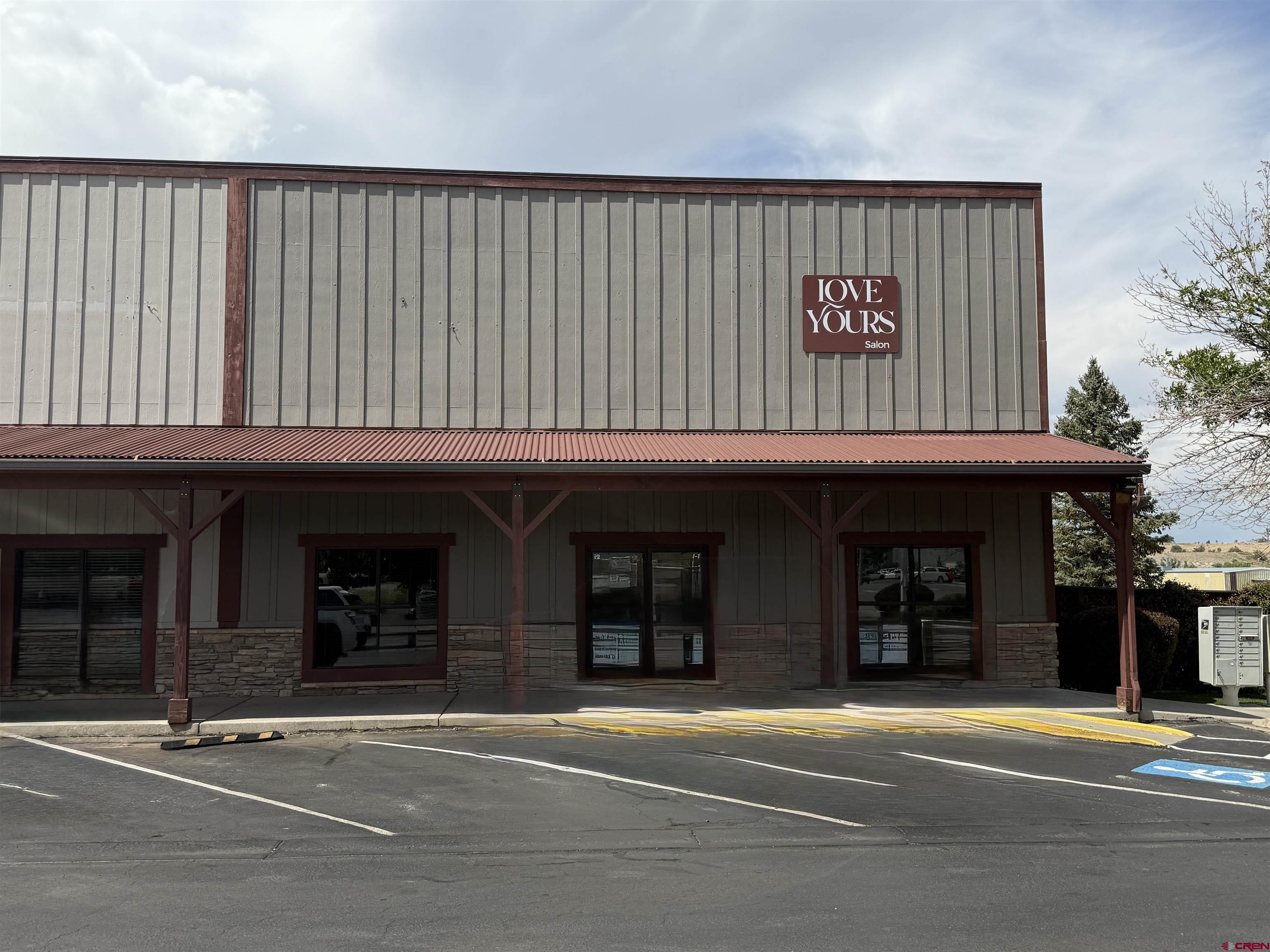 1414 Hawk Parkway, Unit I2 Montrose, CO 81401 - Photo 1 of 20 a view of a building on the street