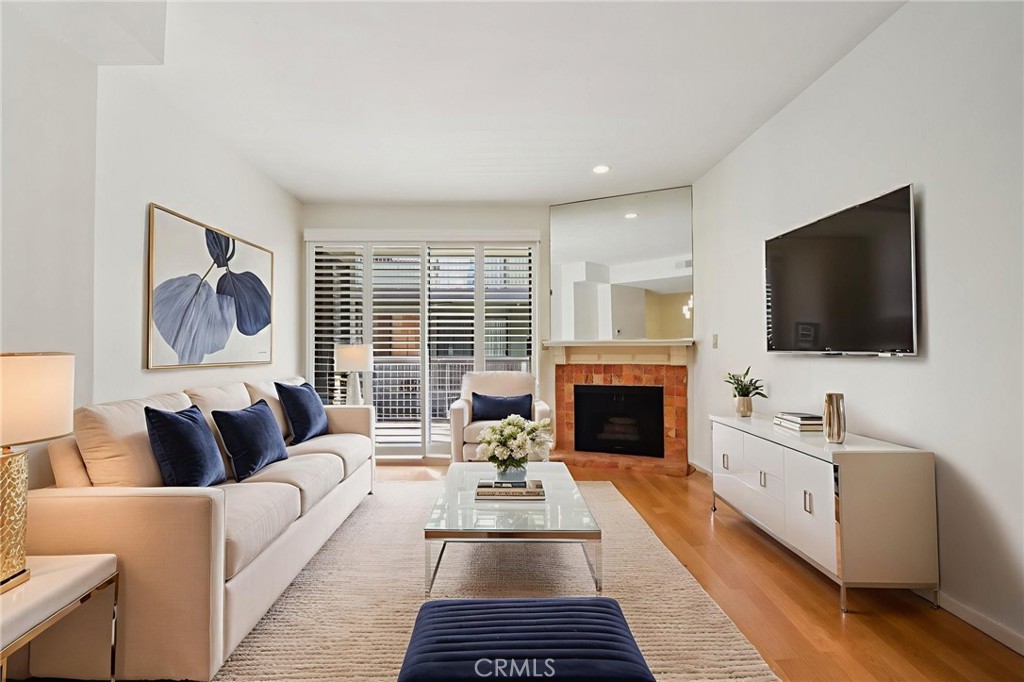 330 Cordova Street, Unit 257 Pasadena, CA 91101 - Photo 1 of 28 a living room with furniture fireplace and flat screen tv