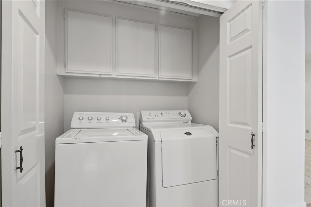 330 Cordova Street, Unit 257 Pasadena, CA 91101 - Photo 12 of 28 a utility room with dryer and washer