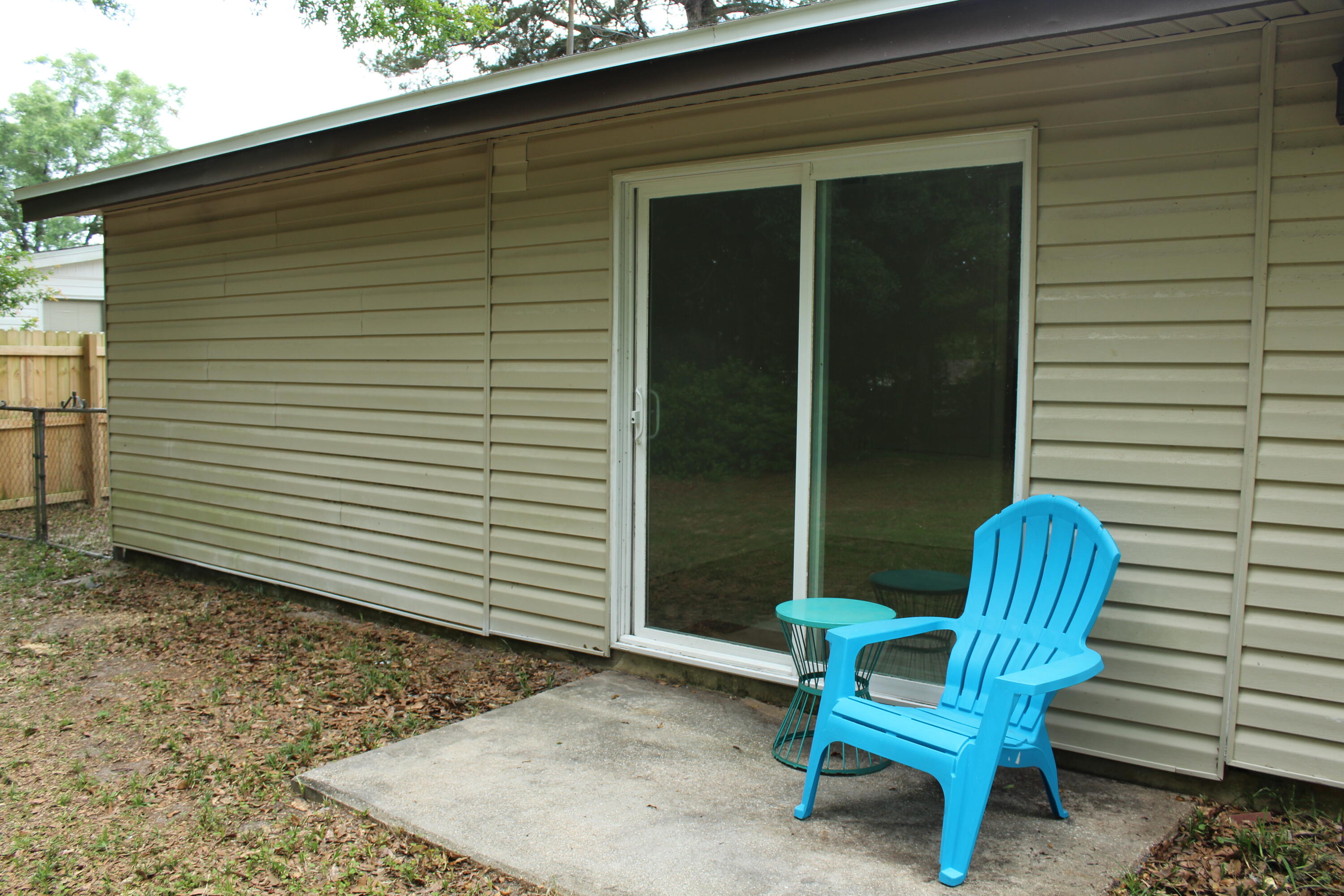 313 Brackin Street, Unit A Crestview, FL 32539 - Photo 21 of 27 a view of a chairs in back of the house