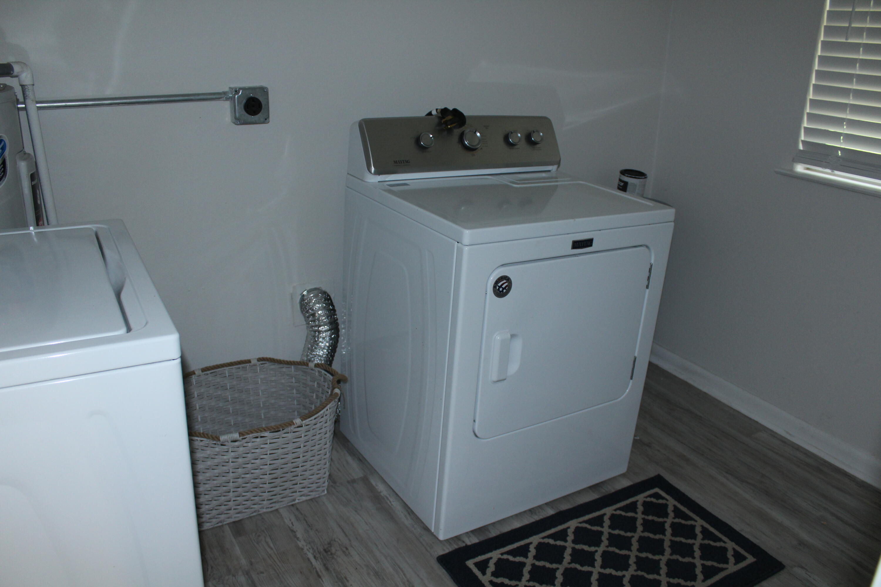 313 Brackin Street, Unit A Crestview, FL 32539 - Photo 22 of 27 a utility room with dryer and washer