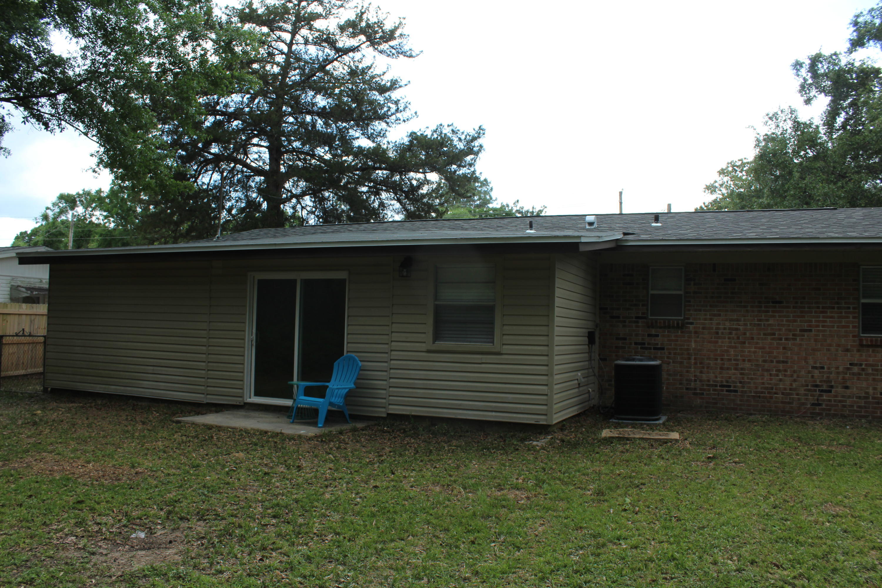 313 Brackin Street, Unit A Crestview, FL 32539 - Photo 4 of 27 a view of a backyard