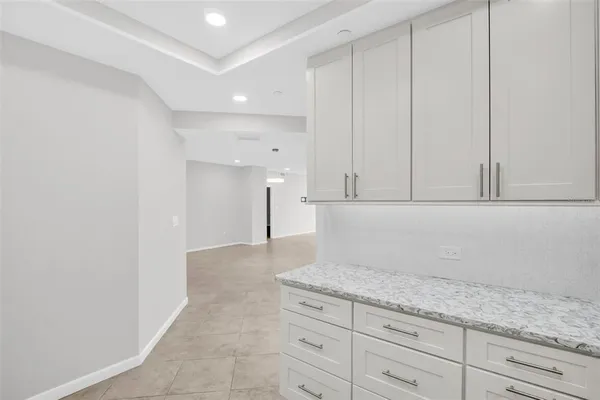 a view of cabinets with wooden floor