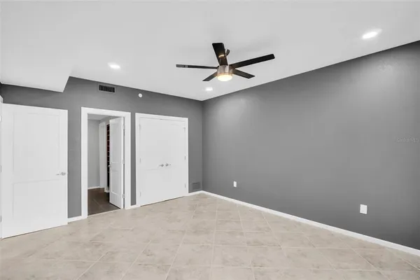 a view of a livingroom with a ceiling fan