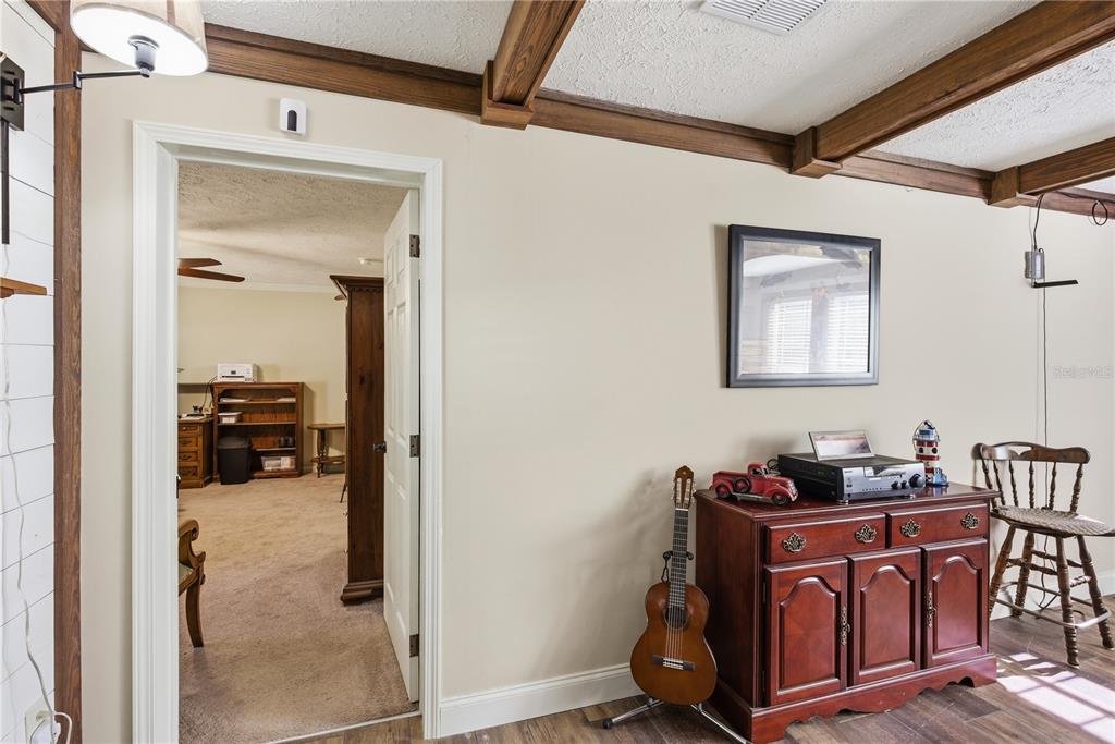 7970 Southwest 14th Place Bell, FL 32619 - Photo 13 of 45 a room with table and mirror