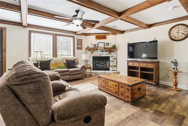 a view of a livingroom with furniture window and outside view