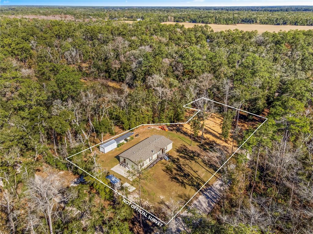 7970 Southwest 14th Place Bell, FL 32619 - Photo 2 of 45 a view of a city