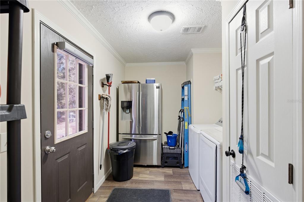 7970 Southwest 14th Place Bell, FL 32619 - Photo 27 of 45 a view of a bathroom with tub and shower