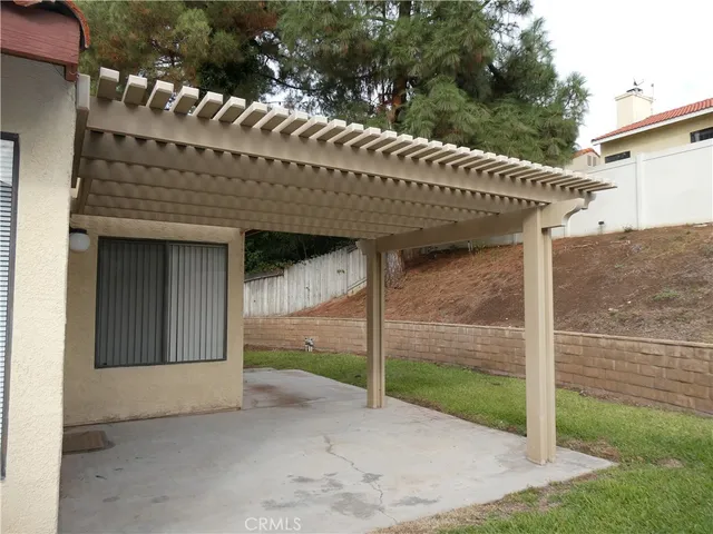 a view of a house with a yard and garage