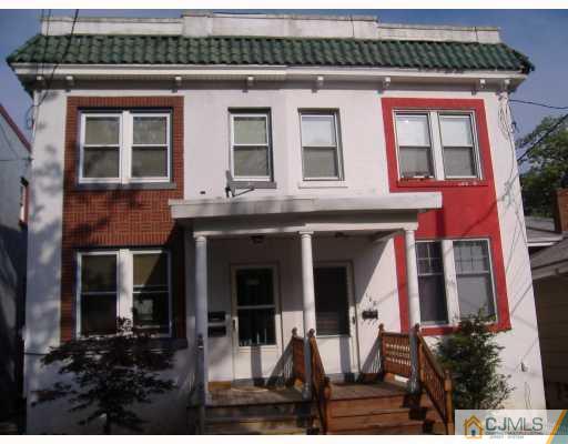 a front view of a house with a porch