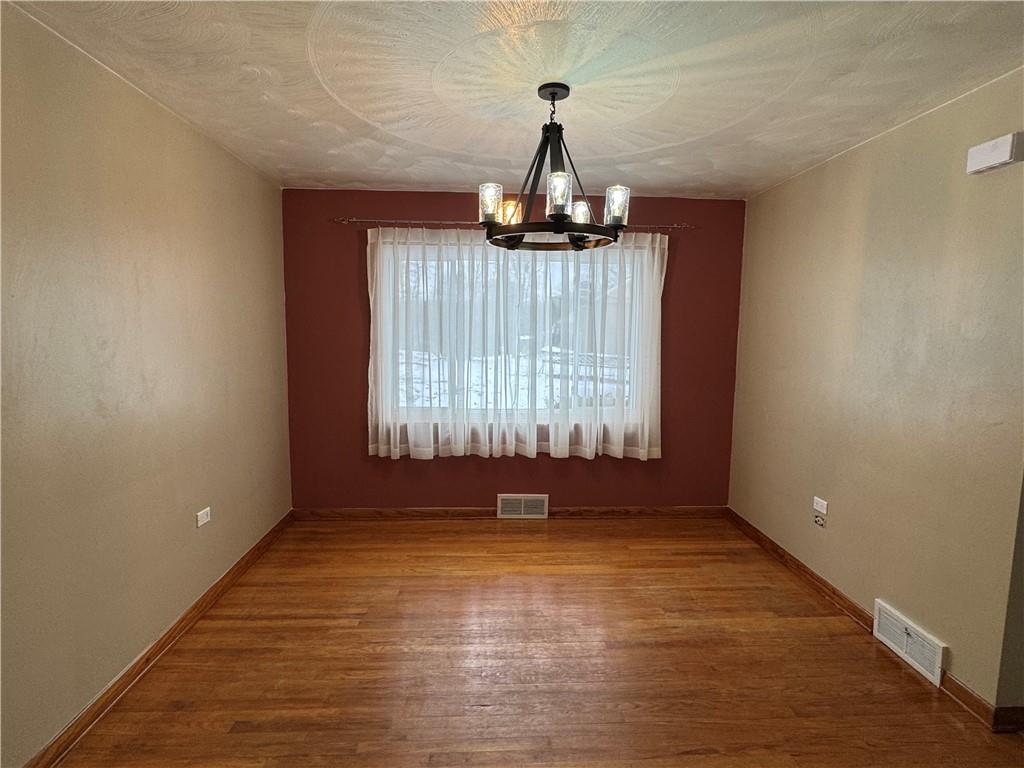 113 Greenhill Drive Butler, PA 16001 - Photo 4 of 19 a view of empty room with a window