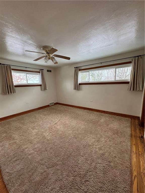 113 Greenhill Drive Butler, PA 16001 - Photo 8 of 19 an empty room with windows