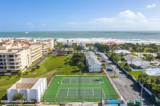 a view of balcony and yard