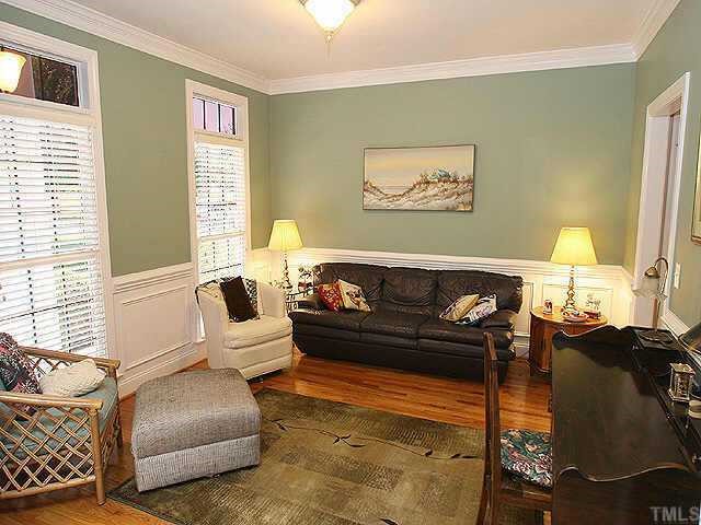120 Challenge Raleigh, NC 27603 - Photo 2 of 9 a living room with furniture and a lamp