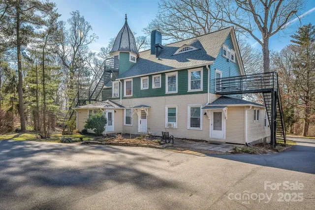 a view of a house with a street