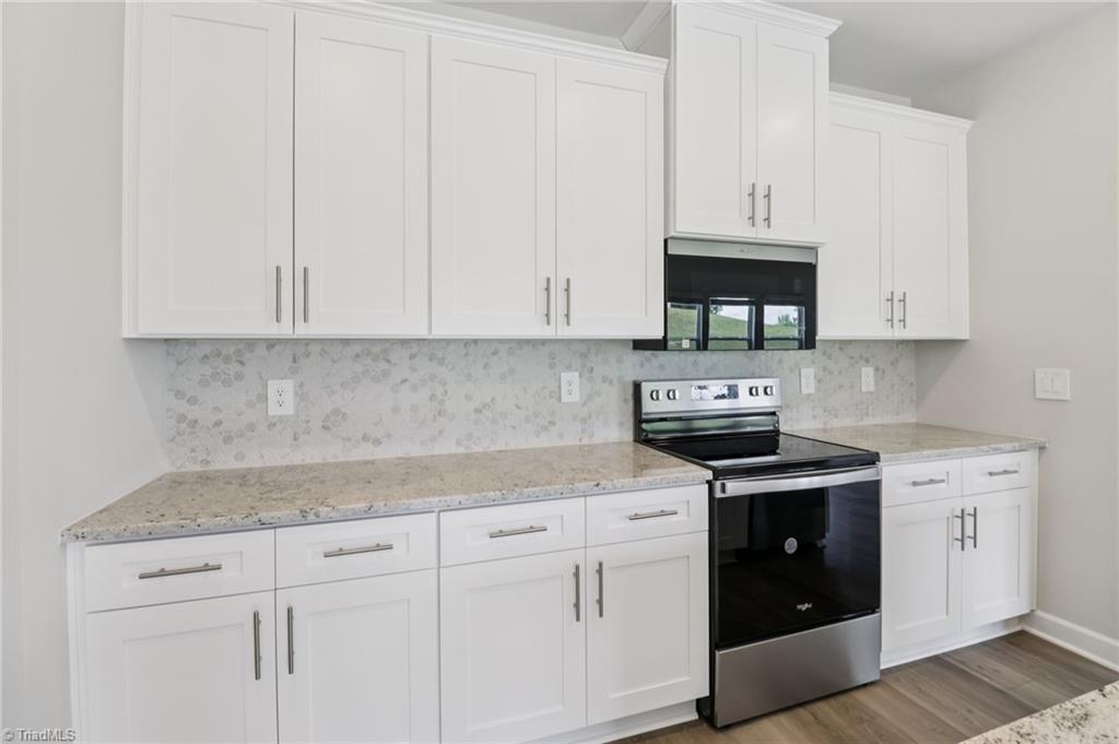 172 Murphy Mdw Road Mocksville, NC 27028 - Photo 3 of 25 Photo is not of the actual home, but is an inspirational photo of builder’s model home and may depict options, furnishings, and/or decorator features that are not included