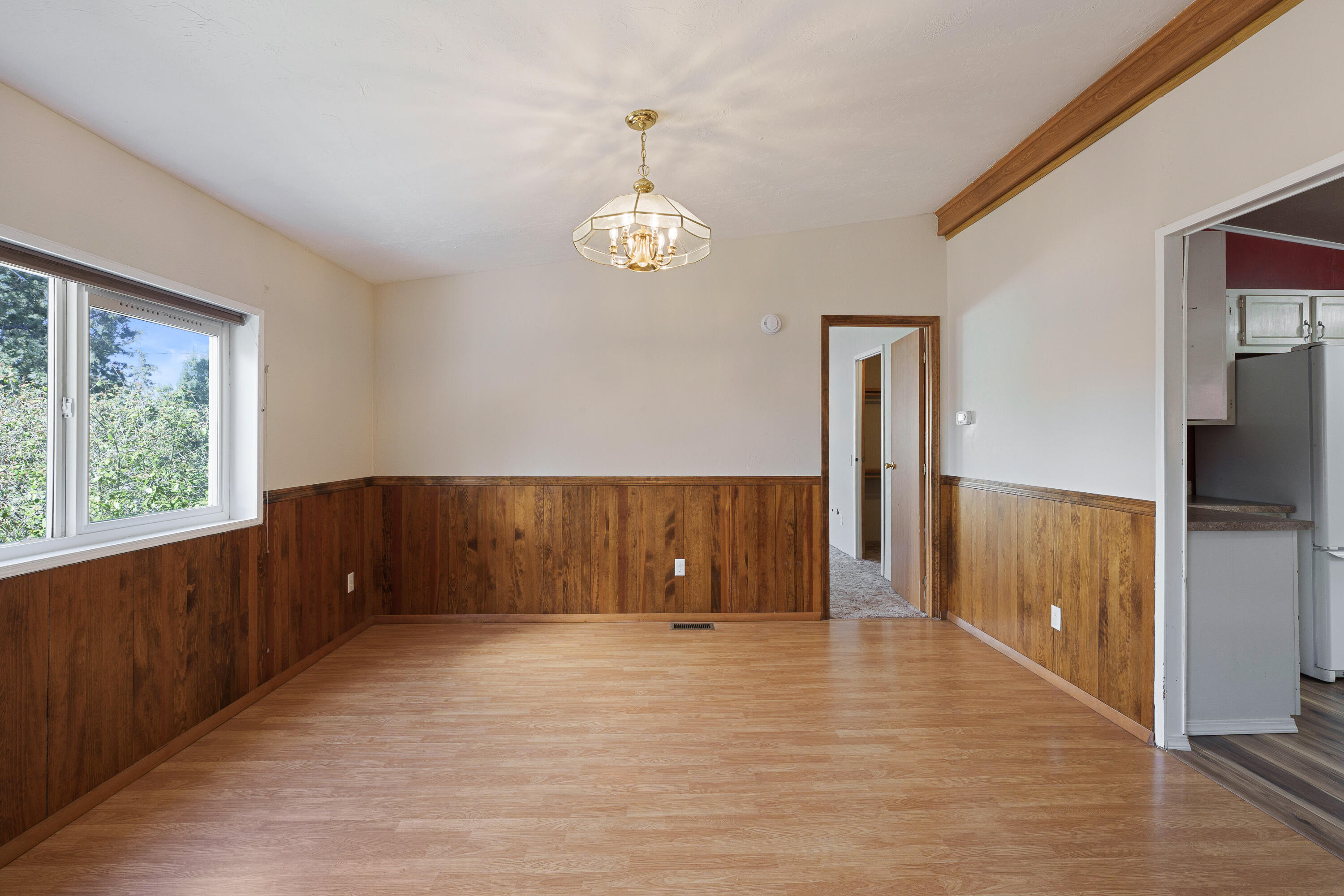 5674 Southeast Davis Loop Prineville, OR 97754 - Photo 16 of 48 a view of room with window and hardwood floor