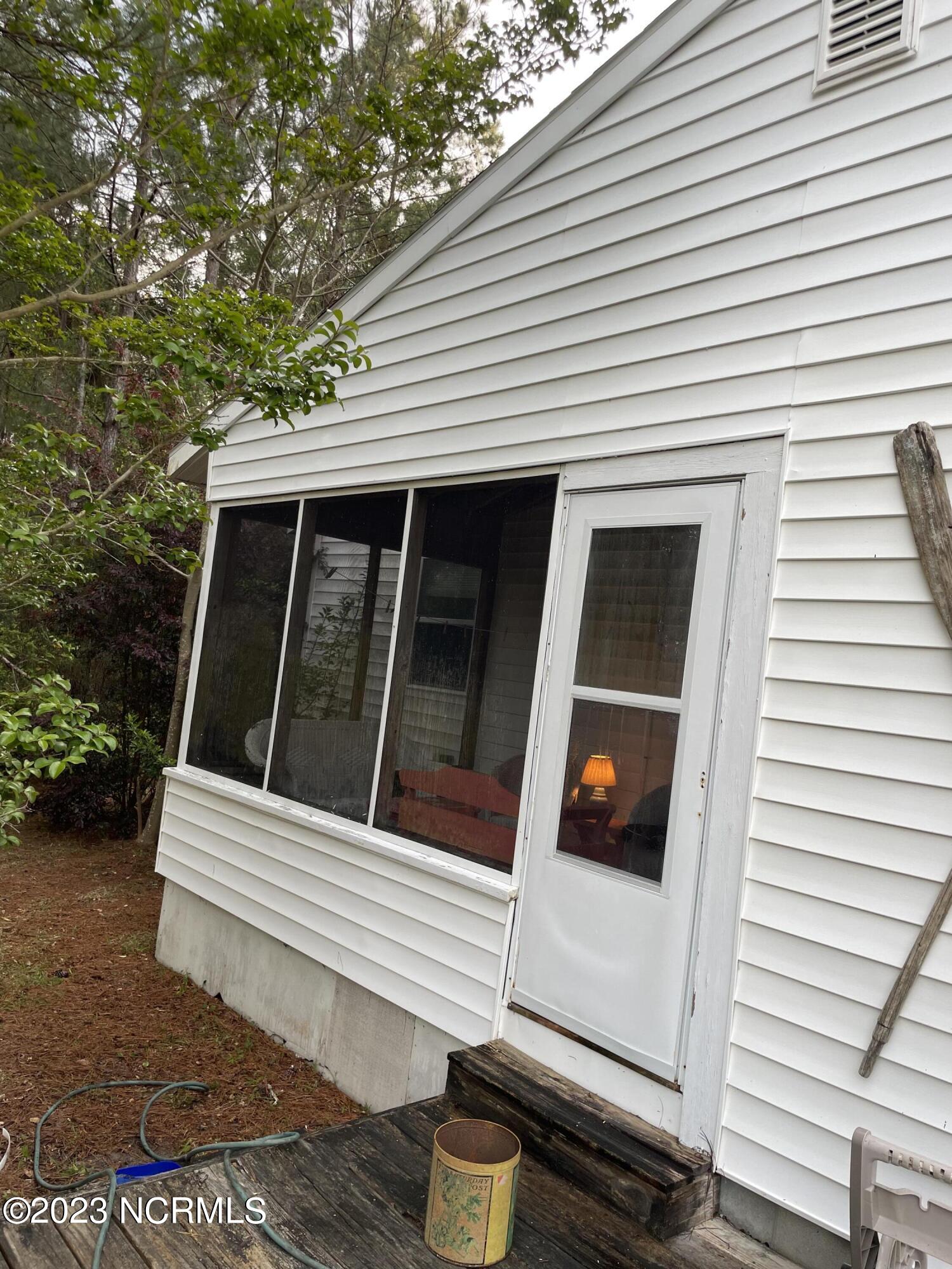 471 Firetower Road Beaufort, NC 28516 - Photo 8 of 13 Screened Porch