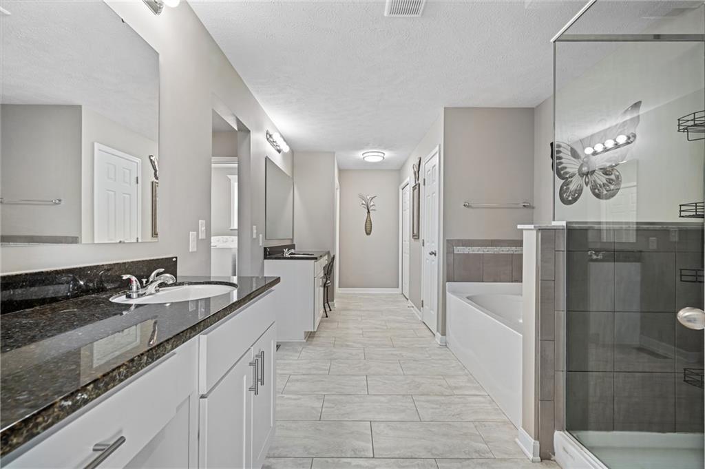 43 Trotter Lane Clinton, PA 15026 - Photo 13 of 34 a large bathroom with double vanity and a shower