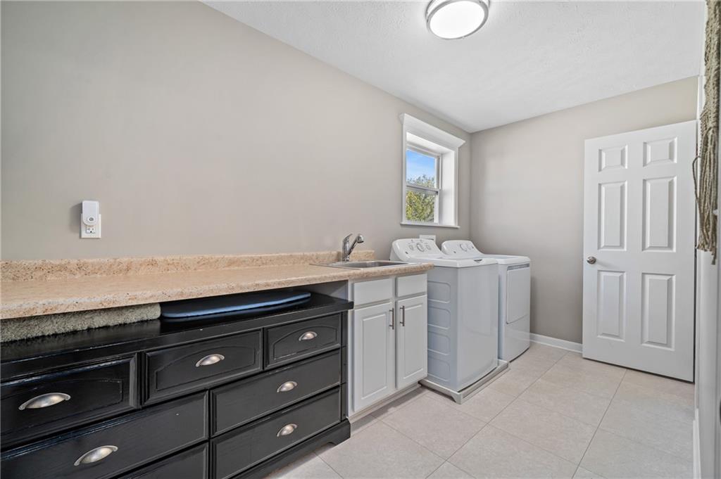 43 Trotter Lane Clinton, PA 15026 - Photo 20 of 34 a bathroom with a sink vanity and mirror