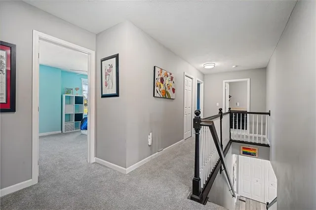 a view of a hallway with workspace