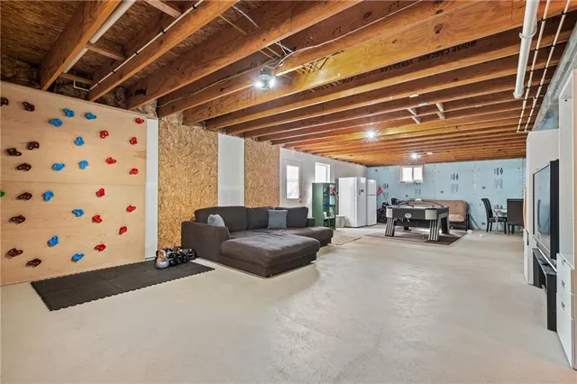 a living room with furniture and a couch