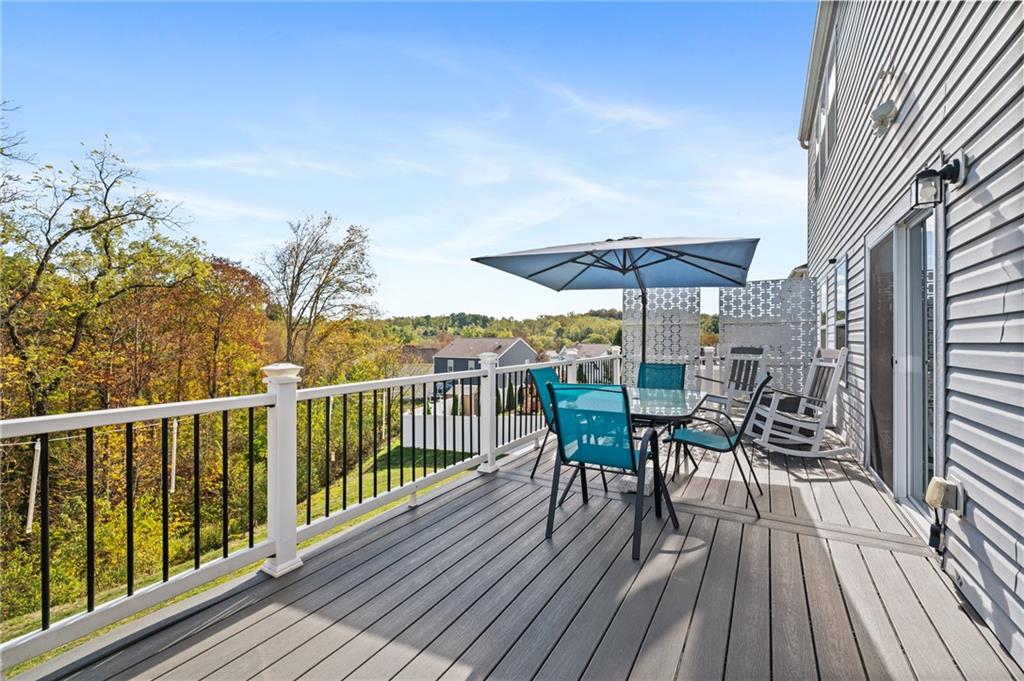 43 Trotter Lane Clinton, PA 15026 - Photo 25 of 34 a view of a deck with furniture and wooden floor