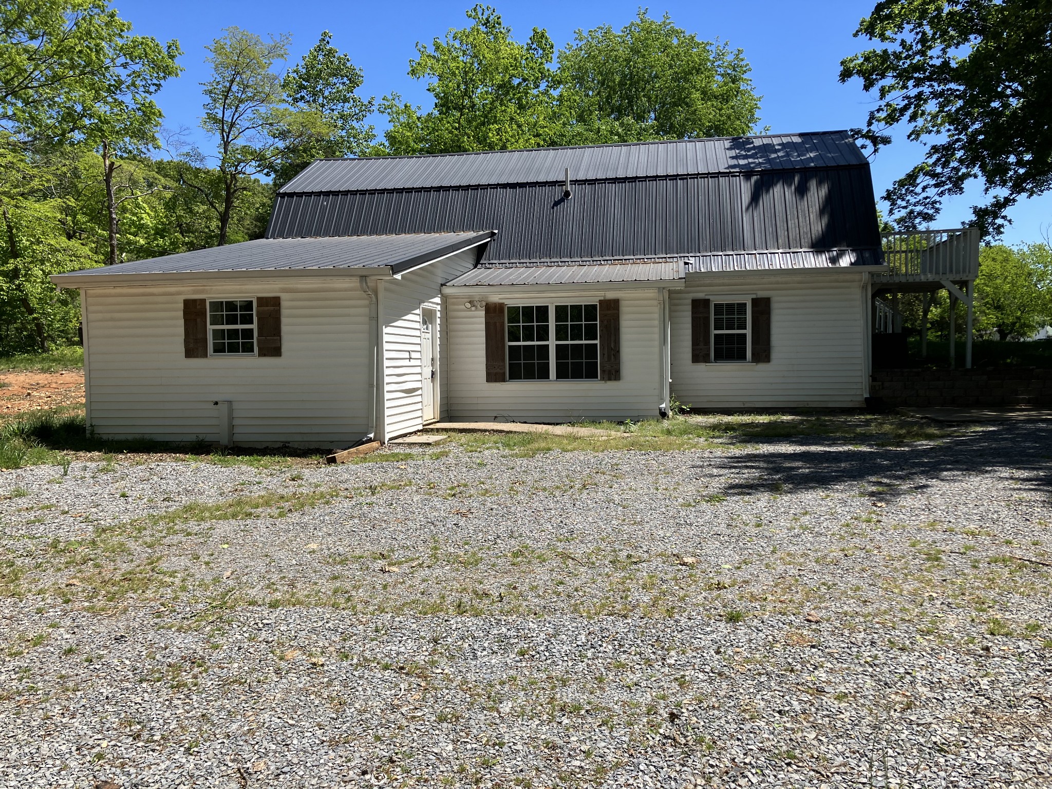 255 S Road Cottontown, TN 37048 - Photo 17 of 35 a view of a house with a yard