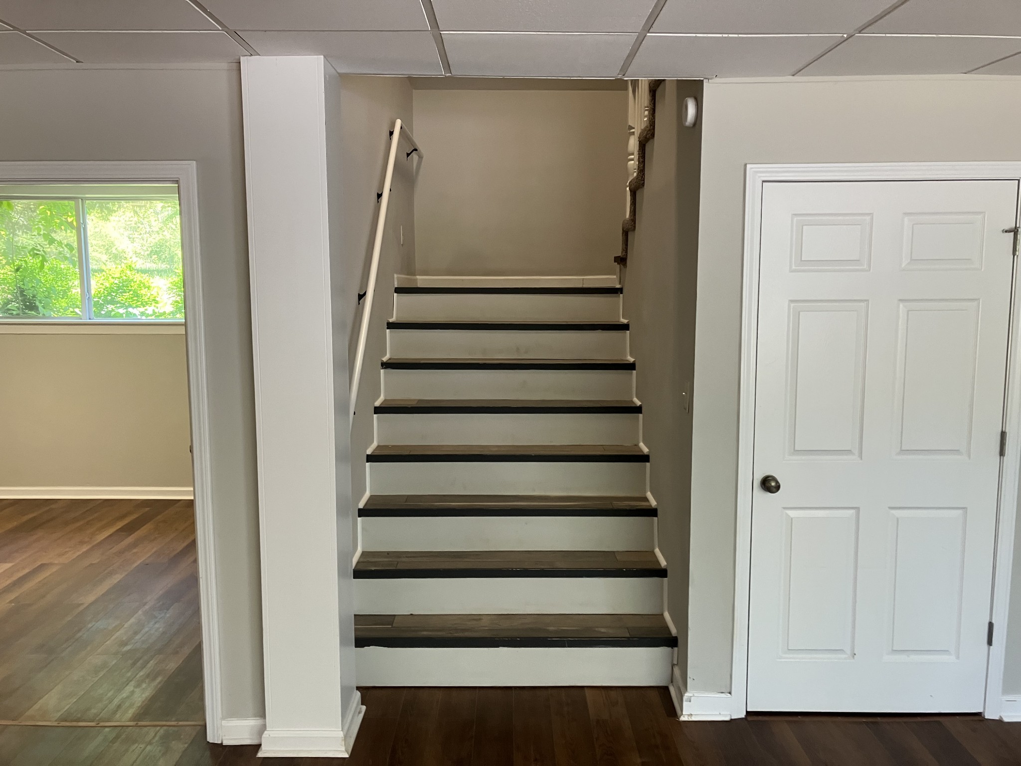 255 S Road Cottontown, TN 37048 - Photo 19 of 35 a view of entryway with stairs and wooden floor