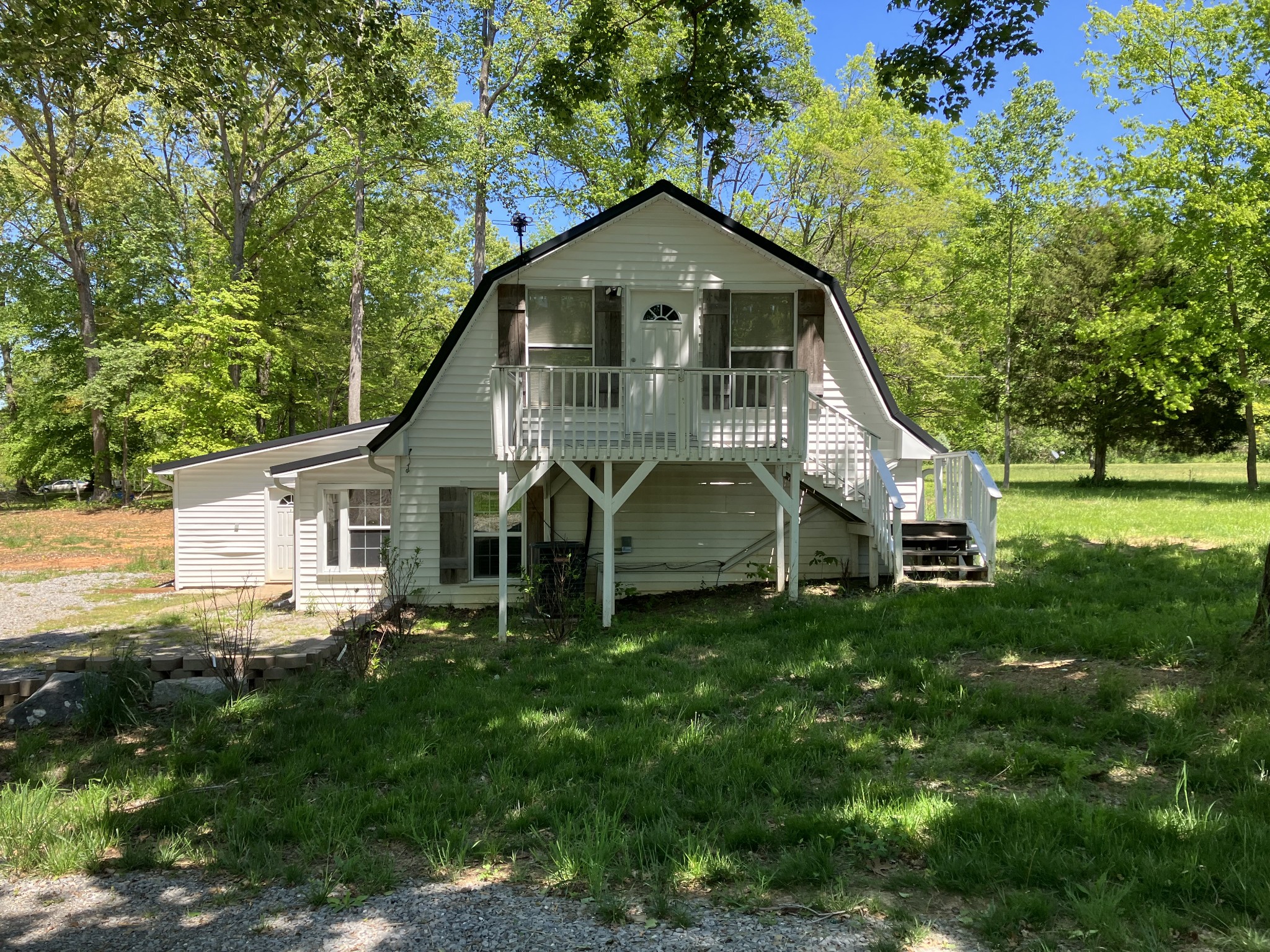 255 S Road Cottontown, TN 37048 - Photo 2 of 35 a front view of a house with yard