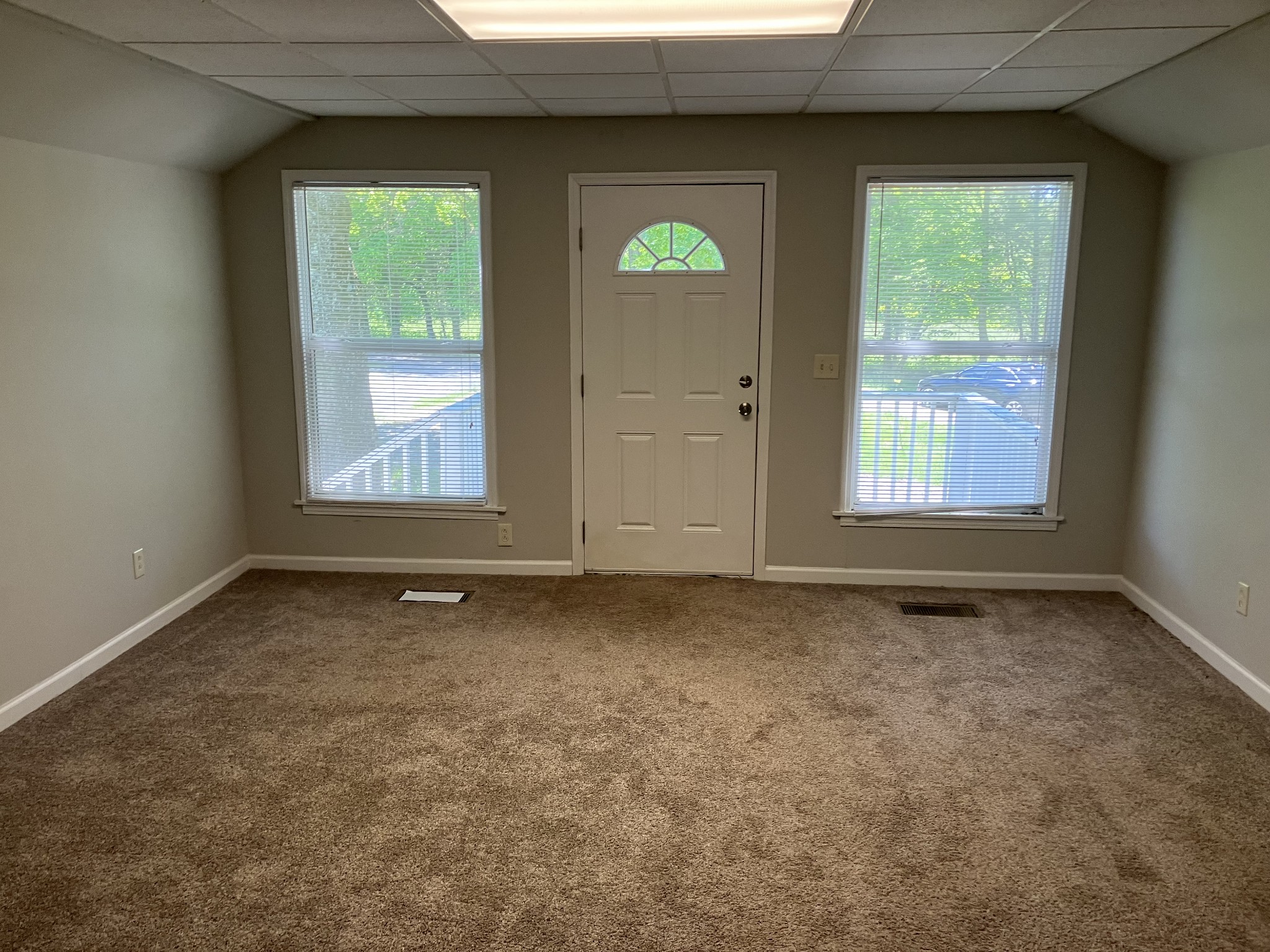 255 S Road Cottontown, TN 37048 - Photo 25 of 35 an empty room with windows
