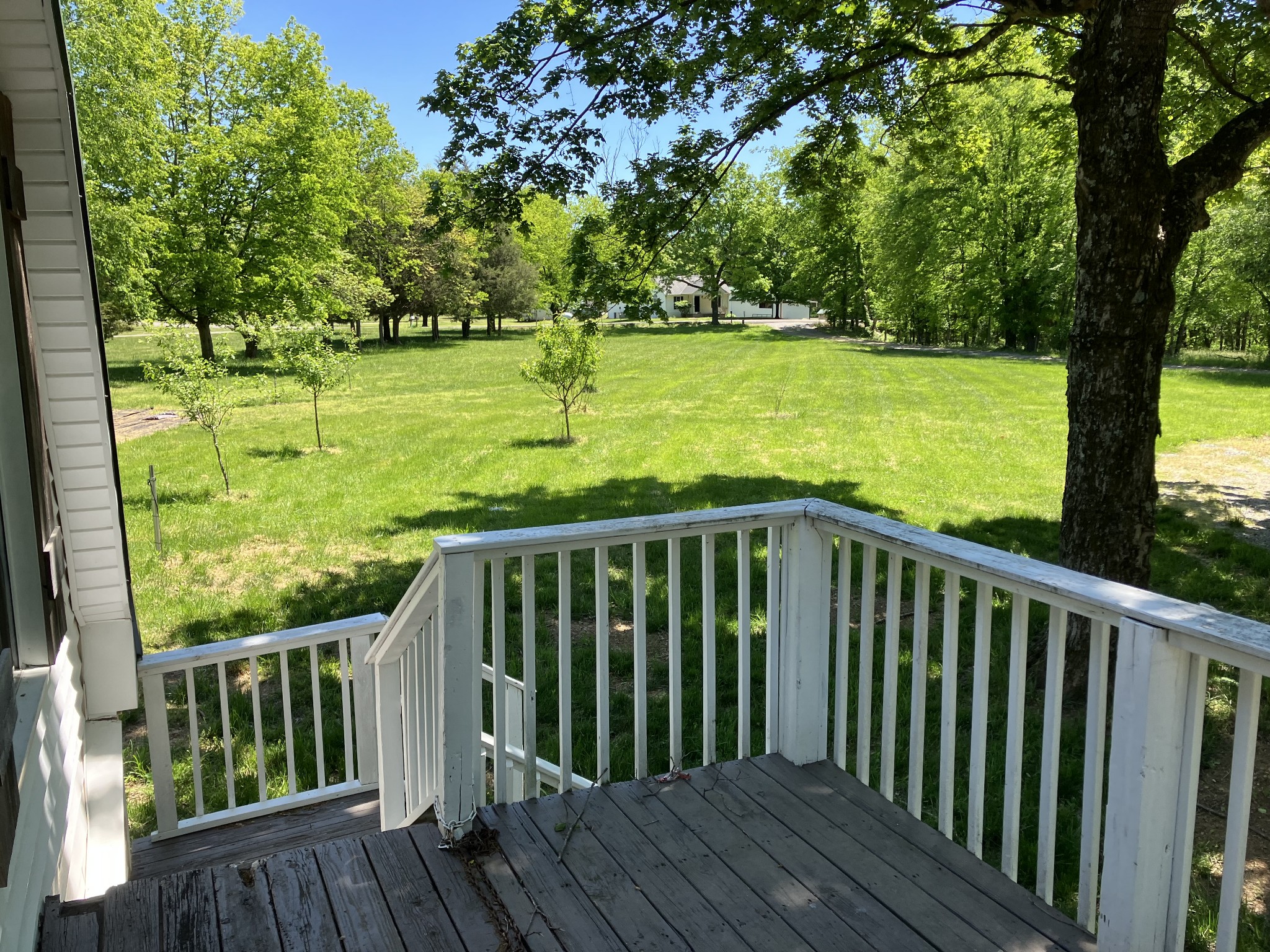 255 S Road Cottontown, TN 37048 - Photo 27 of 35 a balcony with wooden floor and outdoor space