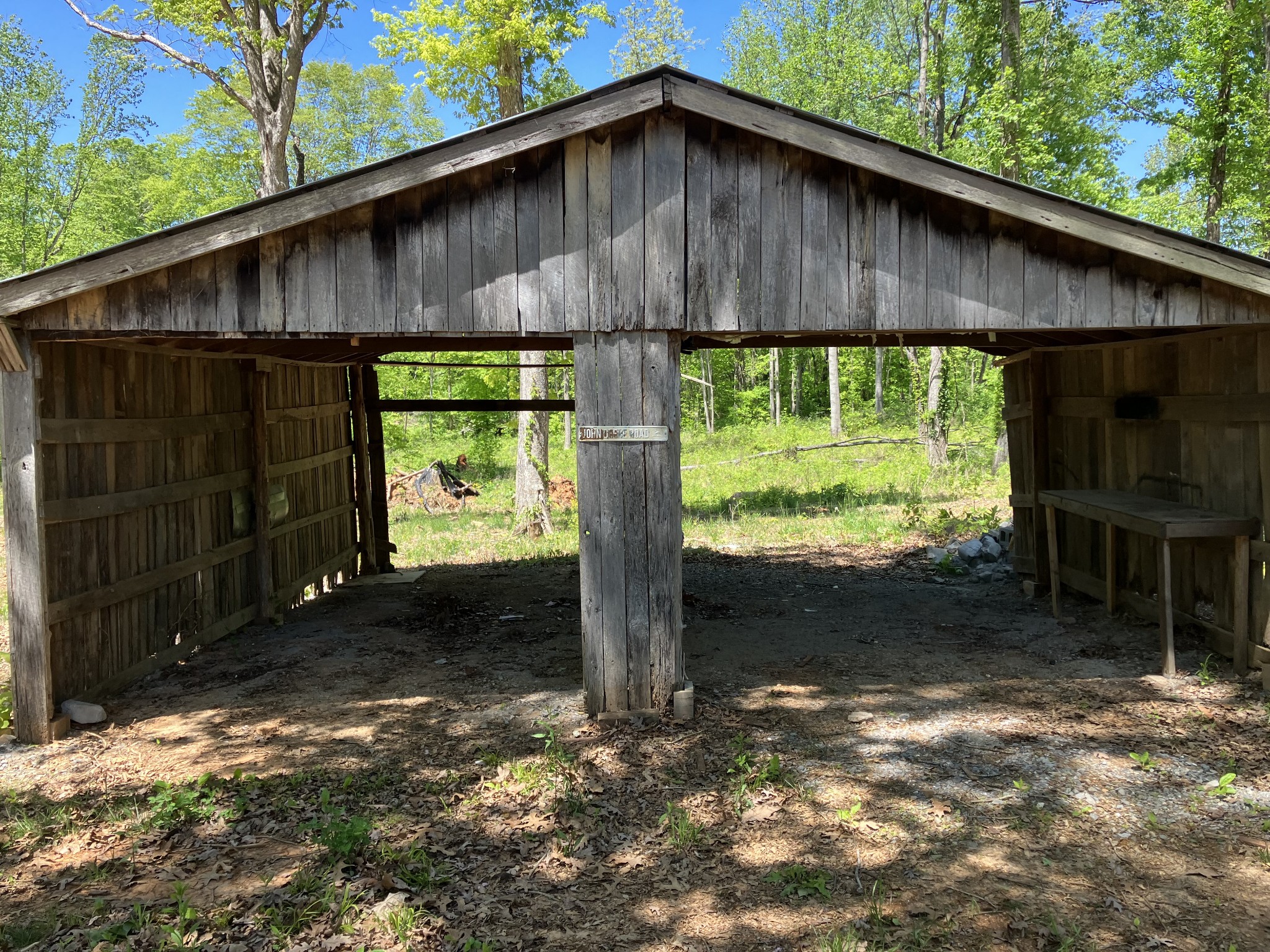 255 S Road Cottontown, TN 37048 - Photo 34 of 35 a backyard of a house with a yard and outdoor seating