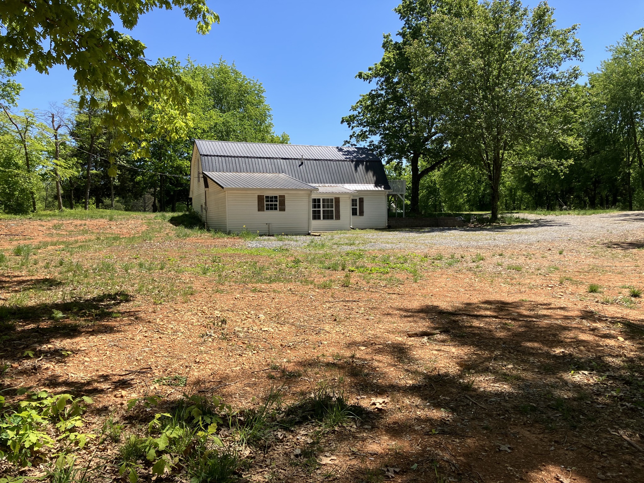 255 S Road Cottontown, TN 37048 - Photo 35 of 35 a house with a garden