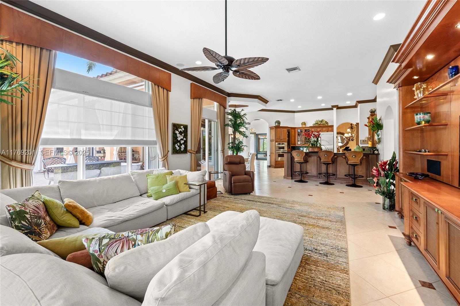 15045 Southwest 37th Street Davie, FL 33331 - Photo 13 of 57 a living room with furniture and a large window