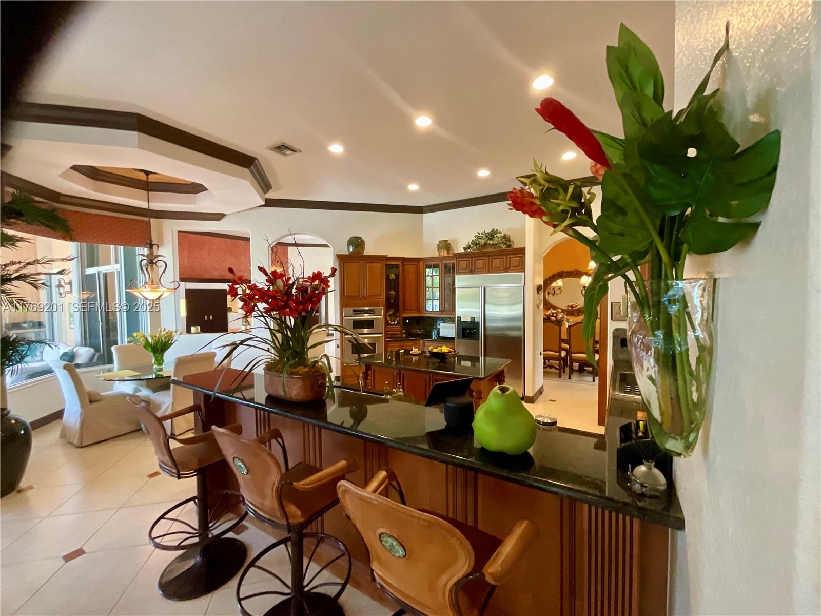 15045 Southwest 37th Street Davie, FL 33331 - Photo 17 of 57 a view of a livingroom with furniture and a potted plant