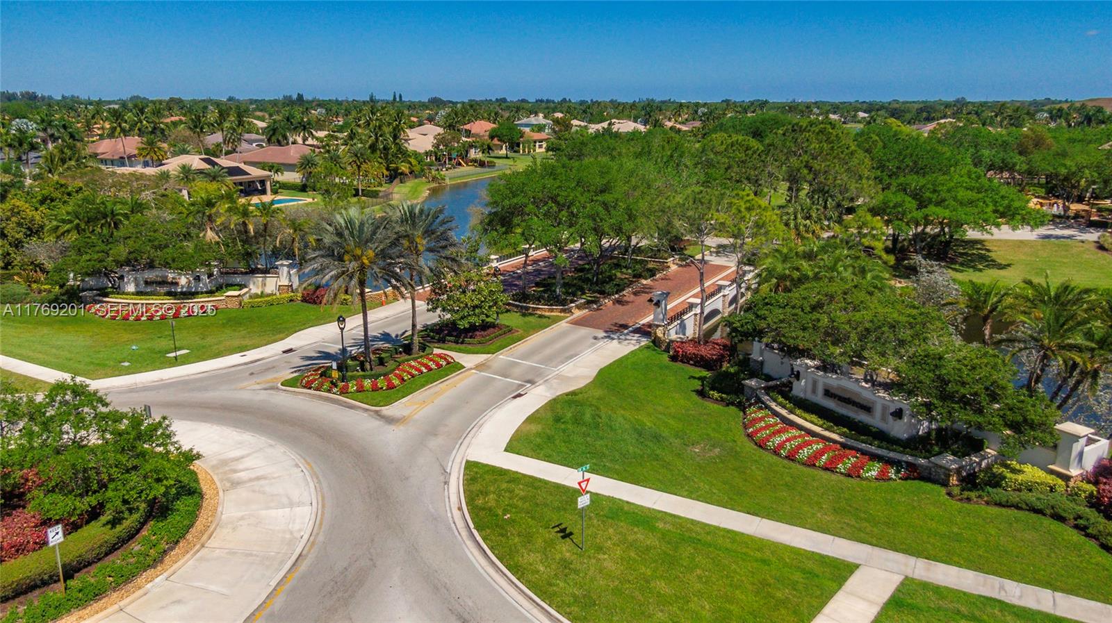 15045 Southwest 37th Street Davie, FL 33331 - Photo 49 of 57 an aerial view of a house with a garden and lake view