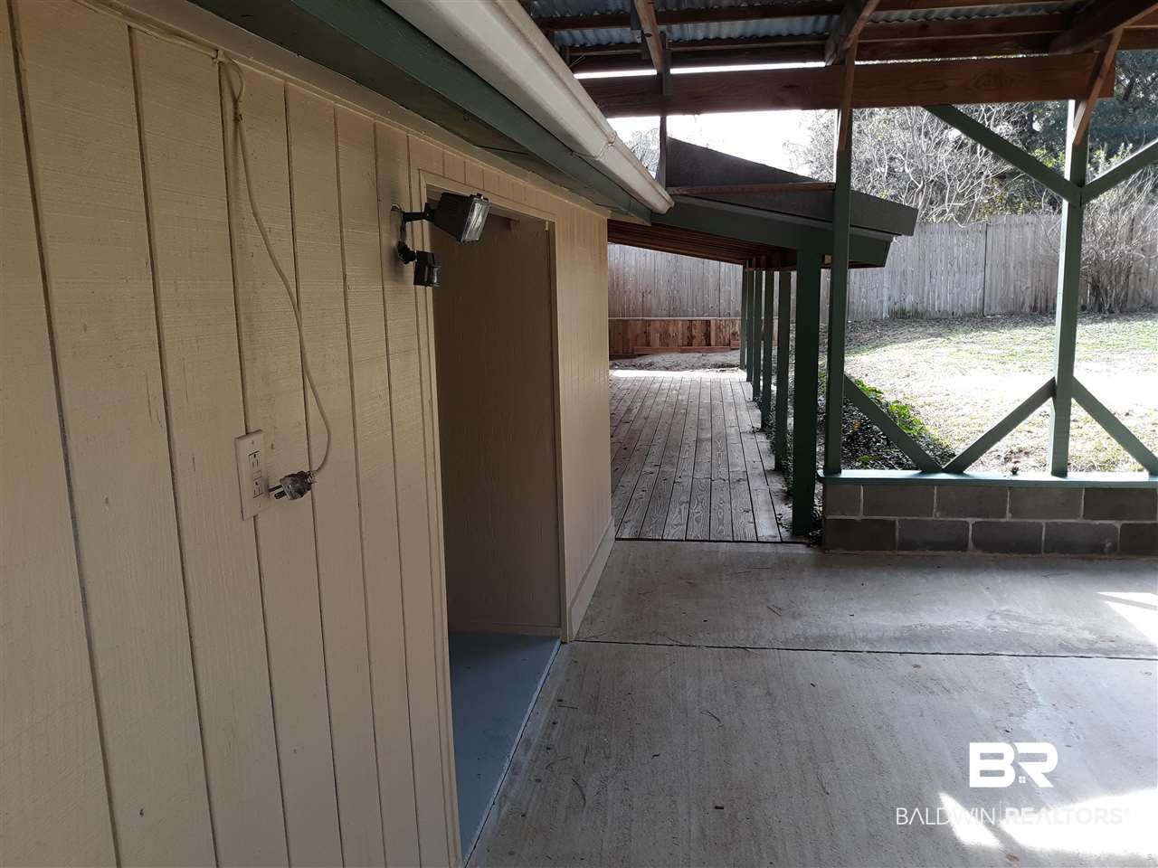 128 Rita Avenue Daphne, AL 36527 - Photo 14 of 18 Coverd porch off kitchen