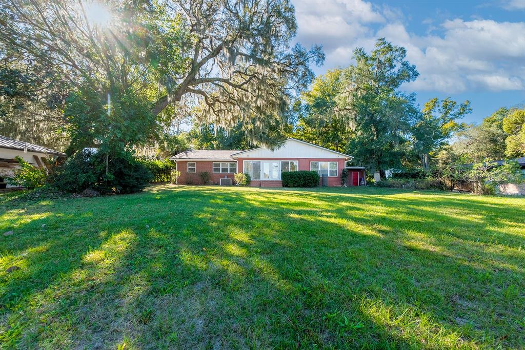 6306 Baker Road Keystone Heights, FL 32656 - Photo 13 of 53 a house view with a sitting space and garden
