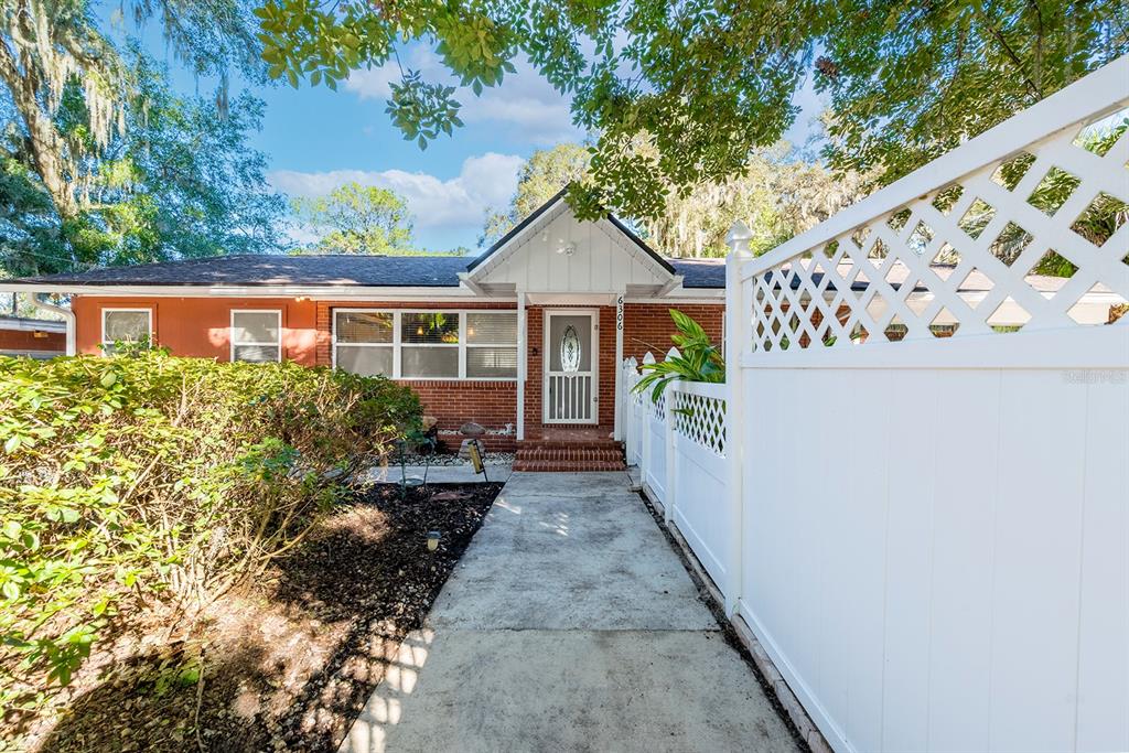 6306 Baker Road Keystone Heights, FL 32656 - Photo 2 of 53 front view of a house with a yard