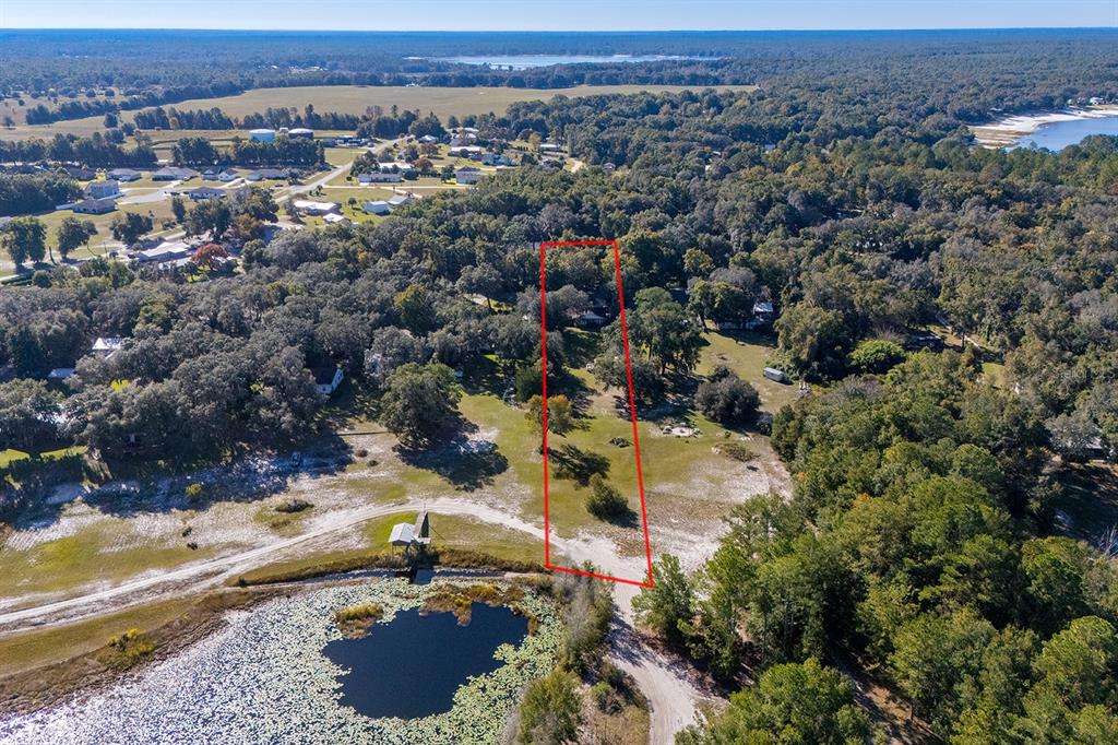 6306 Baker Road Keystone Heights, FL 32656 - Photo 23 of 53 an aerial view of a house with a yard