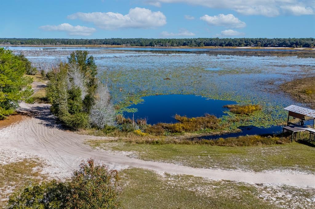 6306 Baker Road Keystone Heights, FL 32656 - Photo 24 of 53 a view of an ocean with beach