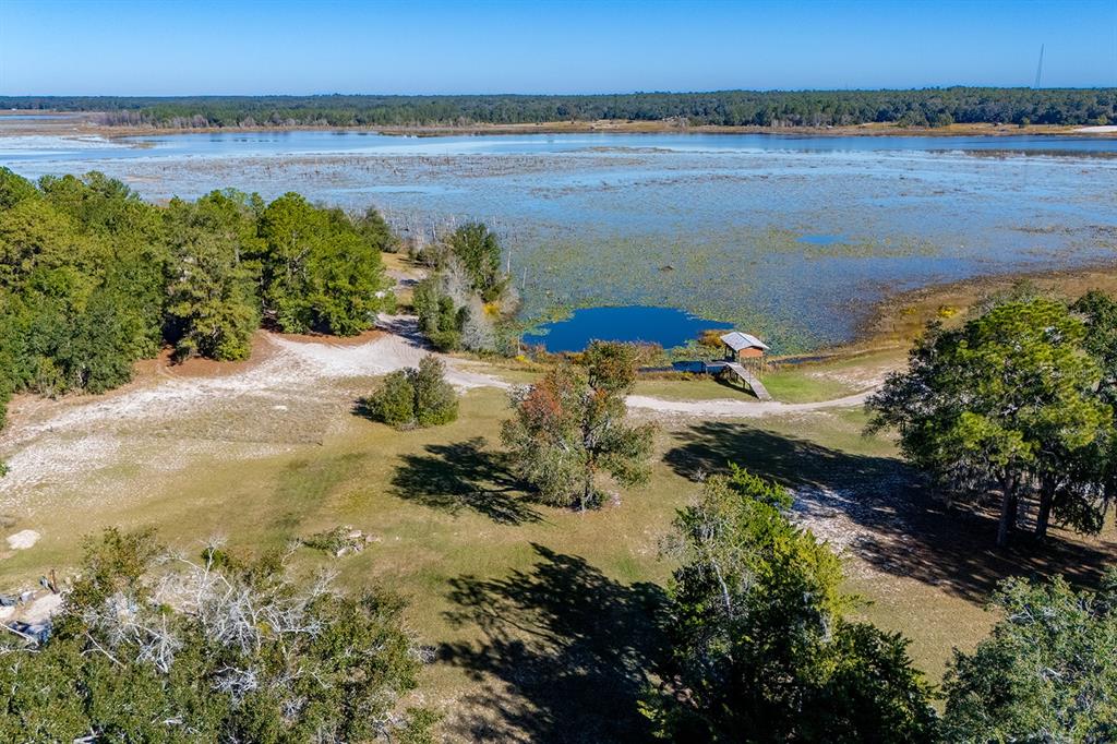 6306 Baker Road Keystone Heights, FL 32656 - Photo 28 of 53 a view of a lake with a mountain