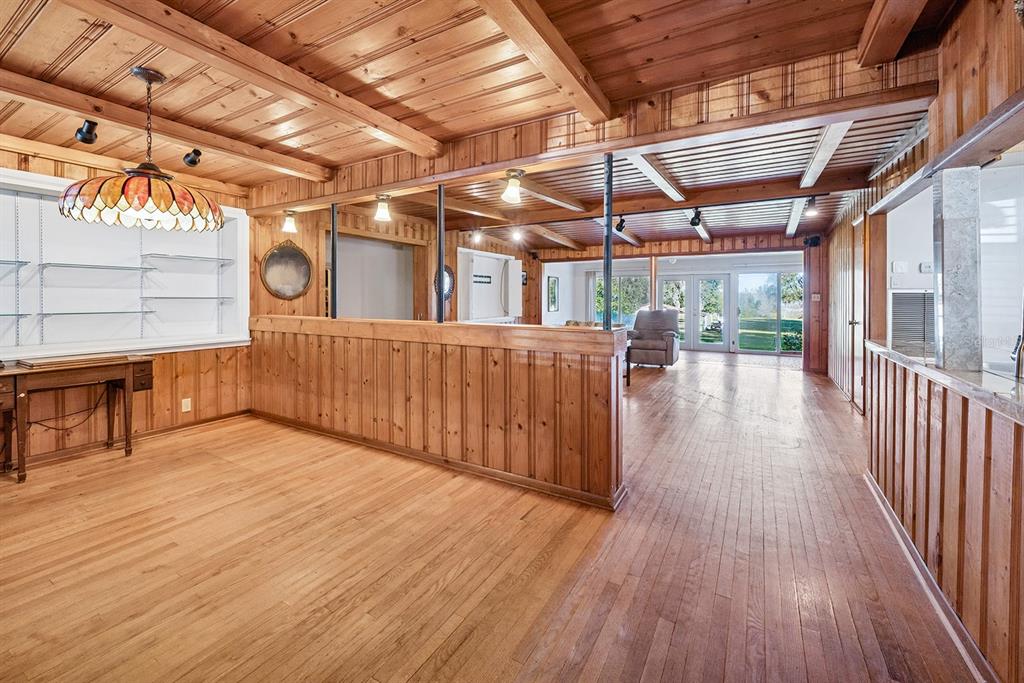 6306 Baker Road Keystone Heights, FL 32656 - Photo 30 of 53 a view of a porch with wooden floor