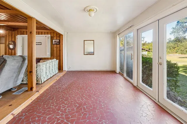 a large kitchen with stainless steel appliances granite countertop a stove and a sink