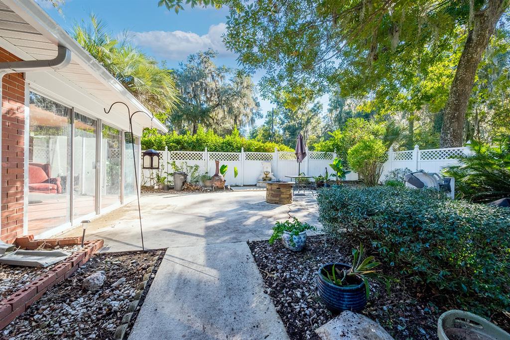 6306 Baker Road Keystone Heights, FL 32656 - Photo 6 of 53 a view of a backyard with sitting area